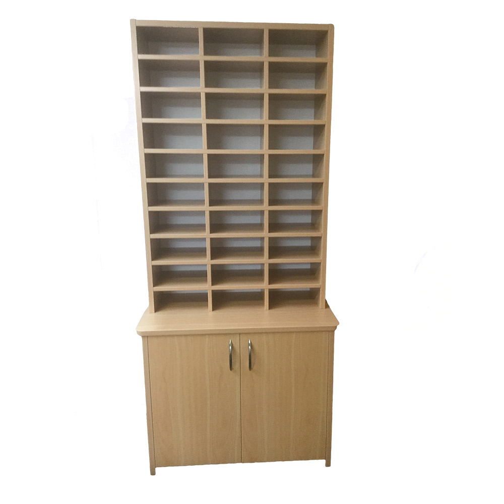 Educated furniture wall unit with cupboard and letter cubby holes